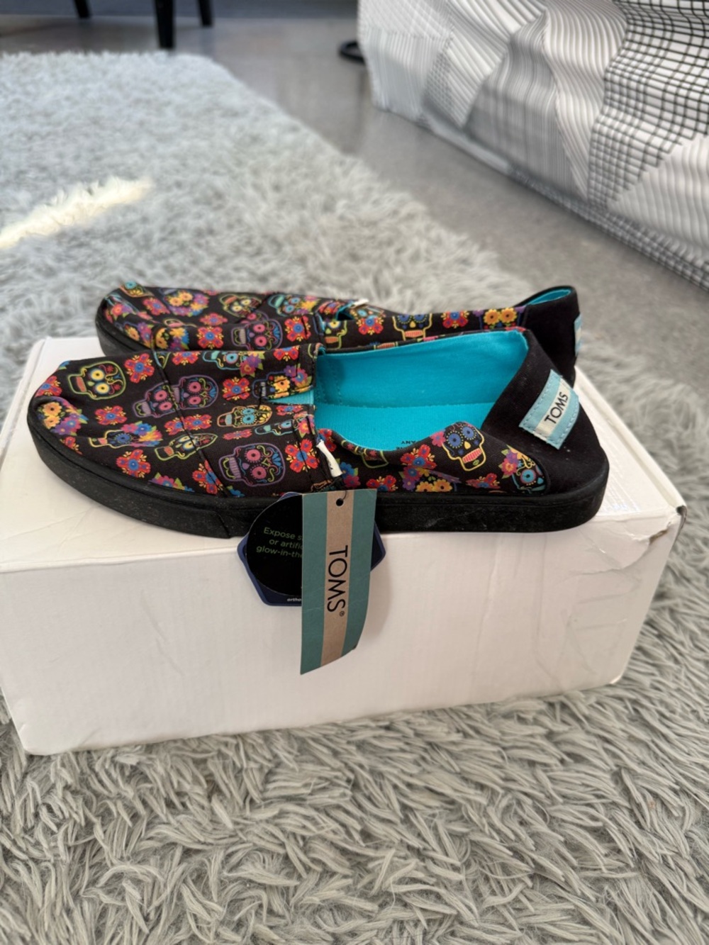 TOMS Kids Slip-On Shoes in Black with Colorful Sugar Skull Print